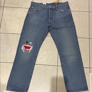 Men's Levi’s 501 Blue Jeans with Patch Detail